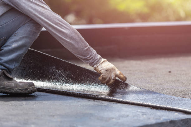 Professional Emergency Waterproofing technician working in Penfield, NY